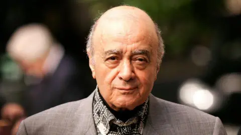 SHAUN CURRY/AFP via Getty Images Headshot of Harrods department store owner Mohamed Al Fayed 