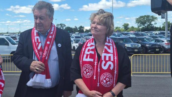 Christophe Gleizes' mother, Sylvie, speaks to journalists outside the New Jersey New York Stadium on Monday